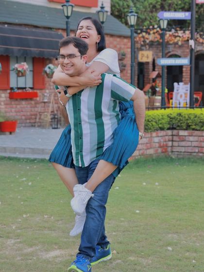 A fun piggyback ride moment. The makeup is designed to be durable and look great even during playful and active shots.