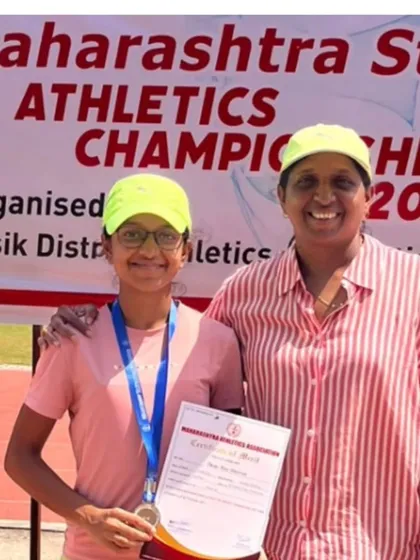 With my athlete Eekisha Bhadsavale after she won a silver medal in the 400m run at the State Junior Athletics Championship.
