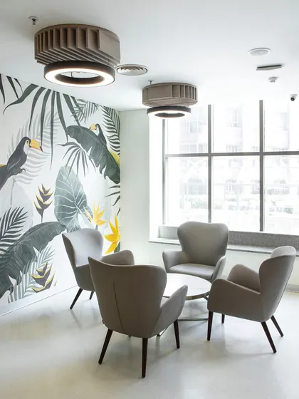 We believe the spaces between destinations are central to the emotional landscape of a hospital. This waiting area uses biophilic patterns and comfortable seating to create a moment of pause and psychological relief, transforming a transitional space into a calming anchor.