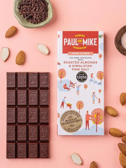 For e-commerce, a clean and minimalist look helps the product shine. This shot for an artisanal chocolate bar uses a simple layout and complementary ingredients to tell the product's story clearly.