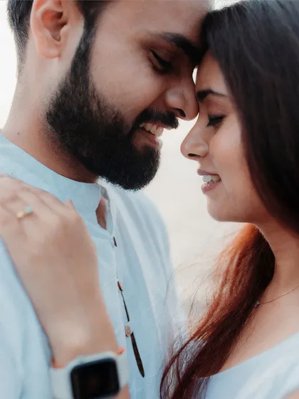 Sometimes the most powerful moments are the quietest. This intimate close up from a pre wedding shoot in Goa captures the gentle, smiling connection between a couple, their foreheads touching in a simple, heartfelt expression of love.