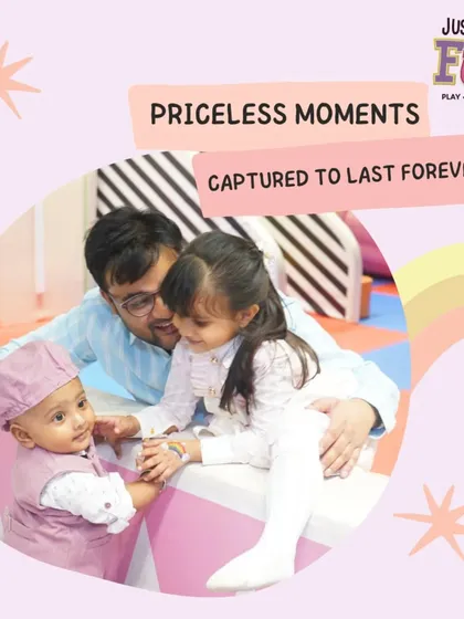 Priceless moments captured to last forever. A tender moment between a father and his children during a party, showcasing the beautiful family connections we get to witness.