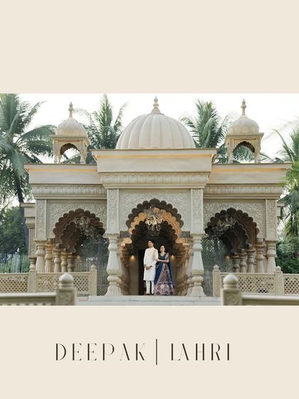 A regal portrait in front of a beautiful temple like structure. This image combines grand architecture with the couple's elegant presence, creating a timeless pre wedding photograph.