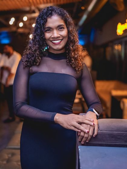 A guest posing for a photo. The lighting and ambiance at my events make for great portraits.