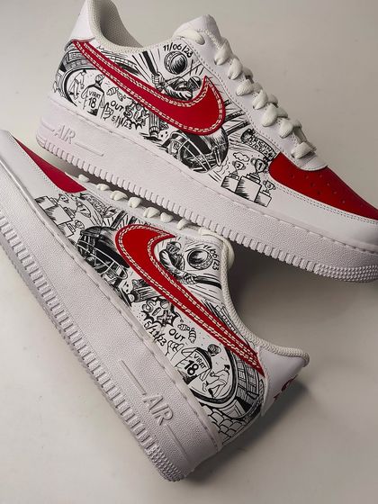 A top-down view of the cricket fan sneakers. The red and white colour scheme is classic, while the black and white doodle art gives it a modern, edgy feel.
