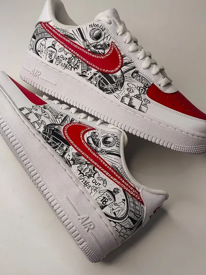 A top-down view of the cricket fan sneakers. The red and white colour scheme is classic, while the black and white doodle art gives it a modern, edgy feel.