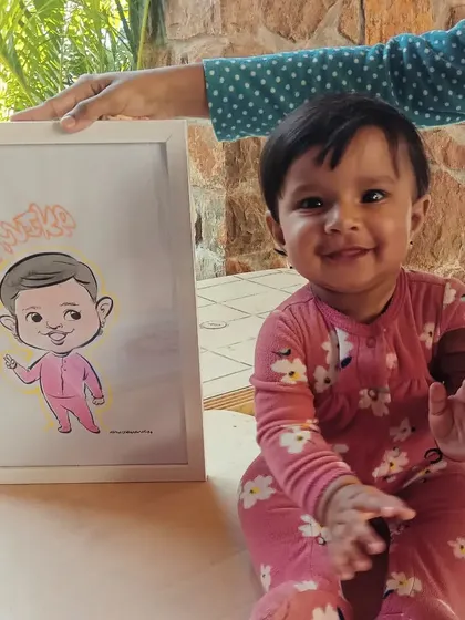 It's pure joy drawing for the little ones. This adorable baby now has her first-ever caricature, a framed piece that her family will treasure for years. My service is a hit at first birthday parties and family functions.