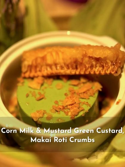 Another look at the Corn Milk & Mustard Green Custard, a dish that plays with sweet and savory flavors.