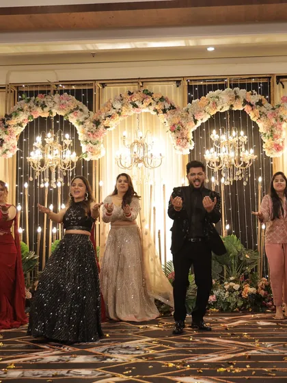 The groom joining the bride's squad for a fun number. We love creating inclusive performances that bring everyone together.