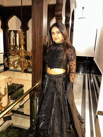 Another view from the grand staircase, this black gown is perfect for making a statement.