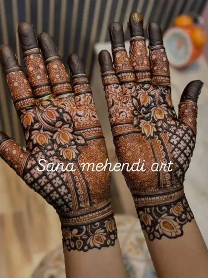 Look at the stunning dark color from my homemade natural henna cone. This full-hand Raksha Bandhan design is filled with beautiful lotus flowers and delicate net patterns, perfect for celebrating with your family.