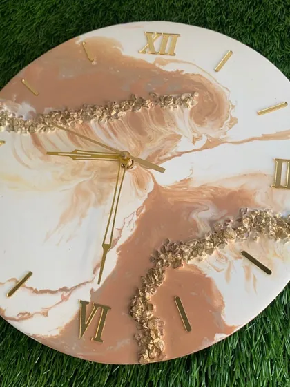 A beautiful geode-style clock with warm brown and white tones, perfect for a cozy and elegant space.