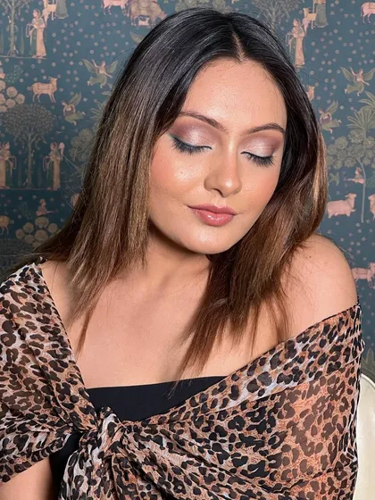 The overall look is chic and sophisticated. It's a great example of a soft glam look that can be worn for any special event.