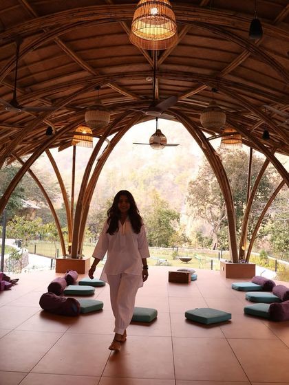 Walking through the shala after a session, feeling the peaceful energy of the space. The architecture itself, made of natural bamboo, contributes to the grounding and serene atmosphere of our retreats.