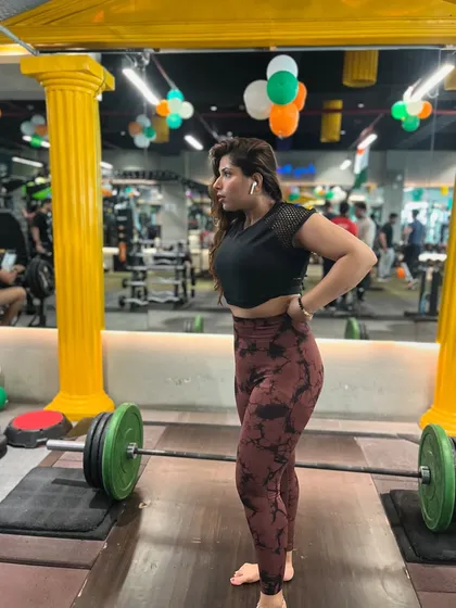 Preparing for a heavy lift. Focus and determination are key to achieving your strength goals.