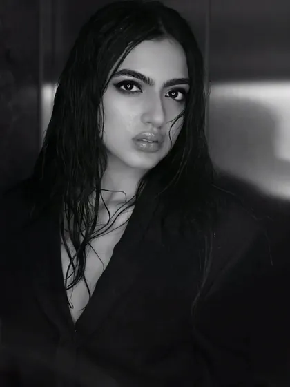A full-frame shot showing the blazer styling with the wet hair and makeup. This demonstrates my ability to collaborate with stylists to create a complete and cohesive editorial vision.