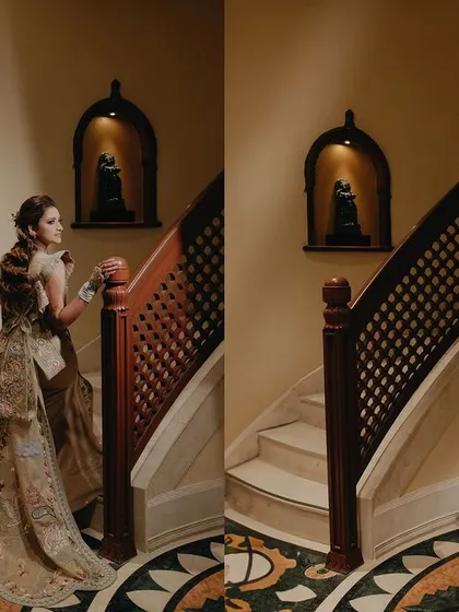 More angles of the bride on the staircase. These shots further showcase the stunning design of her gown and her graceful poise against the classic interior.