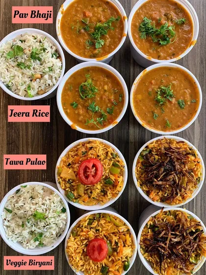 A variety of rice dishes and curries from my kitchen. This includes classic Jeera Rice, Veggie Biryani, Tawa Pulao, and a rich Pav Bhaji, showing the range of meals I prepare.