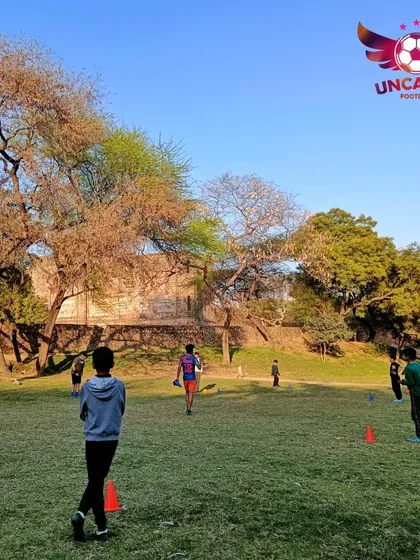 Another glimpse of a training session in progress. You can see the open space and historical surroundings of our home ground at Jamali Kamali.