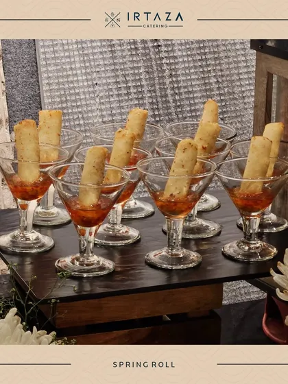 Spring Rolls served in martini glasses with a dipping sauce. This is another example of my stylish and practical presentation for classic appetizers.
