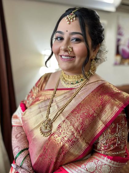 This season, many brides are opting for a natural makeup look. I created this soft, glowing look that enhances her features beautifully.