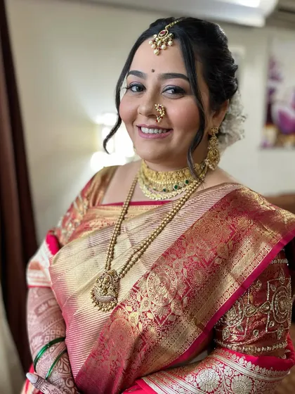 This season, many brides are opting for a natural makeup look. I created this soft, glowing look that enhances her features beautifully.