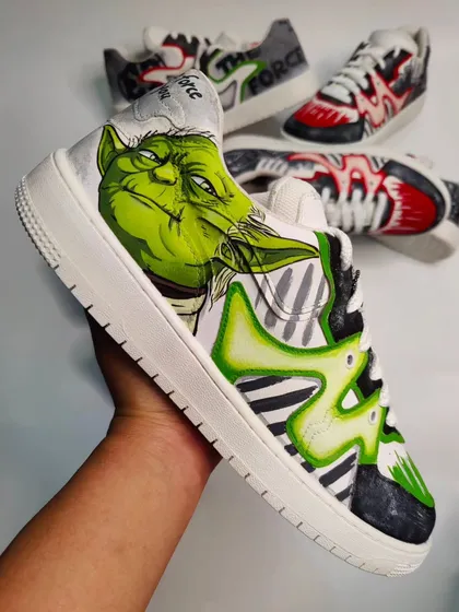 A close-up of the Yoda shoe. I spent a lot of time getting his expression just right. The green light-saber effect highlights the unique shape of the sneaker.