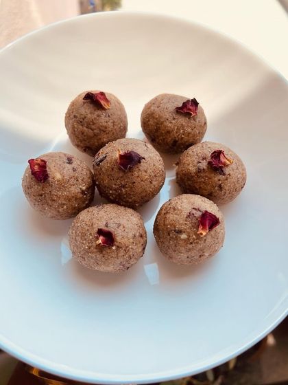 My almond coconut laddus are a delightful treat that simply melts in your mouth. Made with a blend of almond and coconut and garnished with rose petals, they are a must-try for a healthy sweet fix.