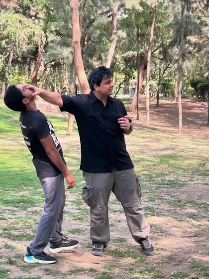 This is a real-world application of a palm heel strike. Notice the explosive upward motion, targeting the chin and jaw. This strike is designed to stun the opponent, disrupt their balance, and create an opportunity for follow-up attacks or escape.