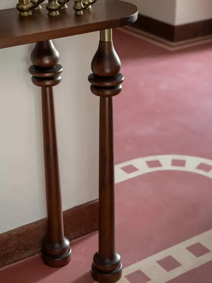 The foyer console from the Layam project, with legs inspired by the traditional Kerala 'Nilavilakku' or lamp. As the Nilavilakku symbolizes prosperity and new beginnings, it's the perfect element to greet guests as they enter the home.