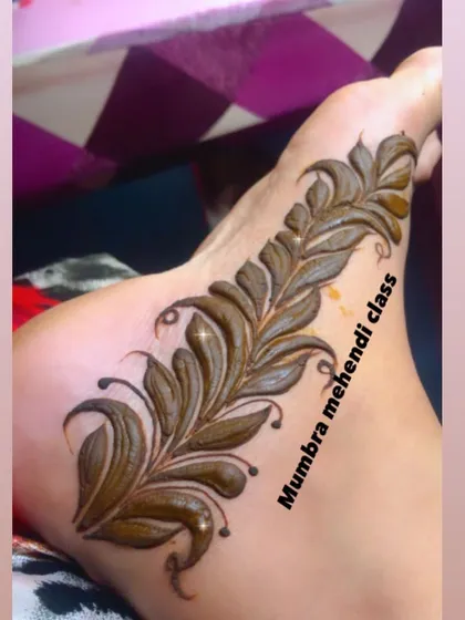 Another angle of the leafy foot design, showing the beautiful shading and line work.