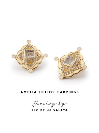 The Amelia Helios Earrings by JJ Valaya feature bold geometric patterns contrasted with intricately shaped semi-precious stones. A statement pair perfect for elevating a workwear look.