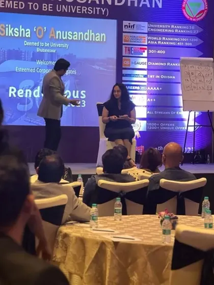 A volunteer from the university event participates in a mind-reading act. My shows are perfect for educational and corporate settings where intelligence and engagement are highly valued.