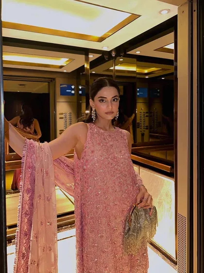 Getting my client ready for the Manish Malhotra Bridal Couture Show. I created a sleek, glamorous half-updo to match the elegance of the designer's creation.