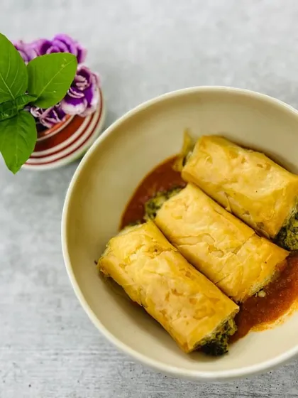 When smoky meets creamy and tangy gets a crunch, magic happens. Our Spinach & Ricotta Spanakopita sits on a bed of rich marinara sauce for a delightful Mediterranean-inspired dish.