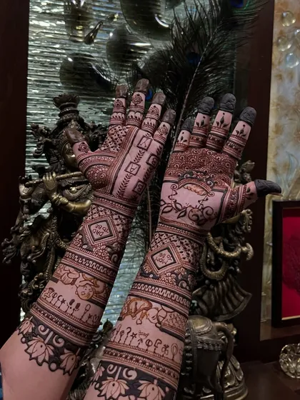 A full view of the baby shower design, with a beautiful Krishna statue in the background adding to the auspicious vibe.