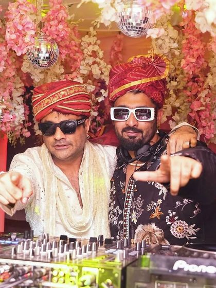 When the baraat turns into a banger. Behind the decks at our fake wedding, ready to drop beats that will make everyone dance.