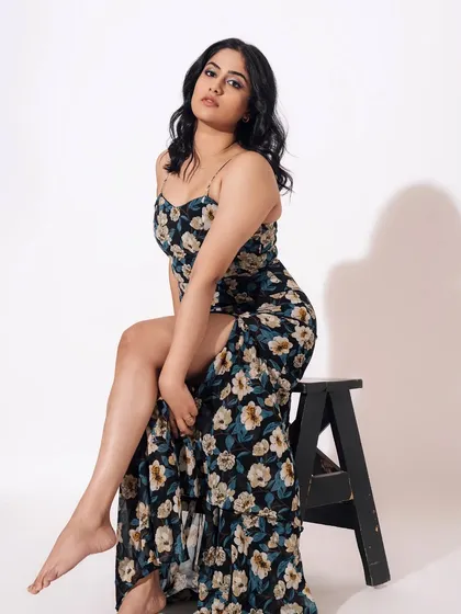 Glamour in full bloom. For this look, I paired a floral dress with a soft, sultry makeup look, featuring a blue graphic liner to add an unexpected pop of color.