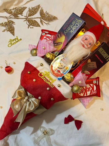 The complete Christmas bouquet, surrounded by festive decorations. It's a perfect centerpiece and a delicious treat all in one.