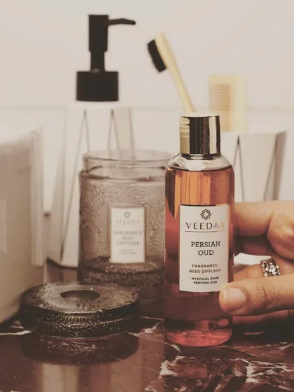 For lovers of rich, deep fragrances, our Persian Oud is a perfect choice. This image highlights the diffuser oil refill bottle, a sustainable option to keep your favorite scent going in our reusable glass vessels.