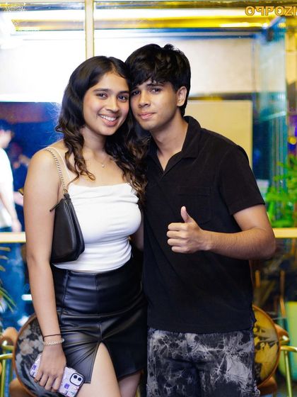 A happy couple enjoying the Saturday night vibe.