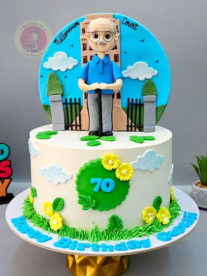 A 70th birthday cake for an uncle who loves nature and taking care of his society, featuring a figurine of him in a garden setting.