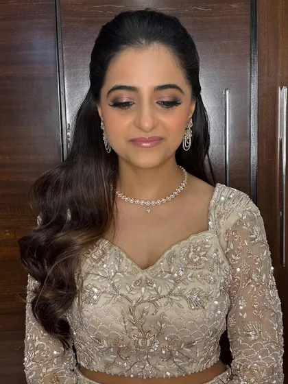 A beautiful shot with eyes closed to show the soft blend of the smokey eyeshadow. This cocktail look is all about sophisticated glamour.