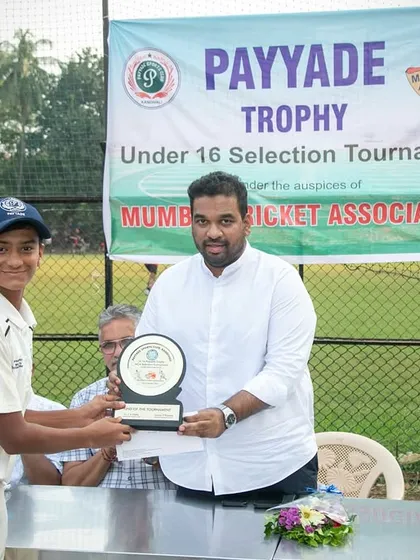 Recognizing individual excellence at the U-16 Payyade Trophy. One of our club officials presents an award to a young player for his outstanding performance during the selection tournament.