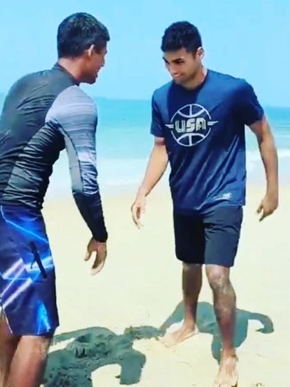 The moments before a roll. Two members square up on the sand, ready to test their Jiu-Jitsu skills against each other and the elements. This is where you learn to stay calm and focused under pressure.