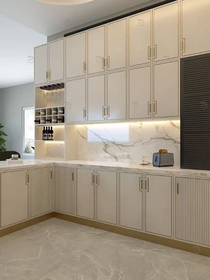 This angle showcases the extensive storage solutions, including overhead cabinets and a dedicated space for the oven, all finished with elegant gold PU grooving.