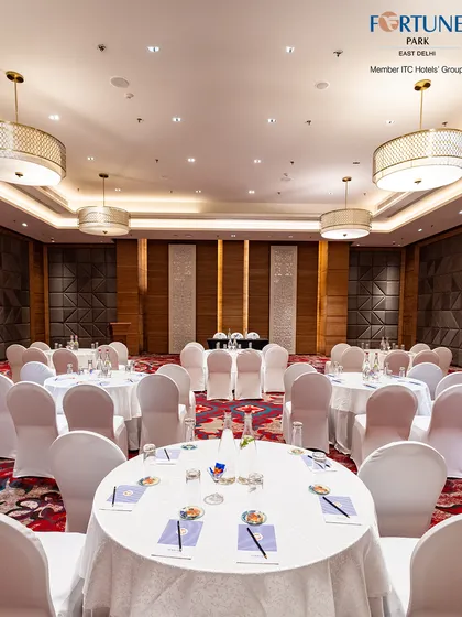 My banquet hall is perfectly suited for large corporate gatherings and seminars. The cluster-style seating arrangement seen here is ideal for workshops and interactive sessions, providing a comfortable and professional atmosphere.