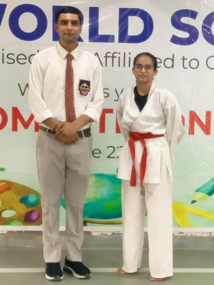 With a student at a school-level competition. I actively participate as a judge and mentor in zonal events.