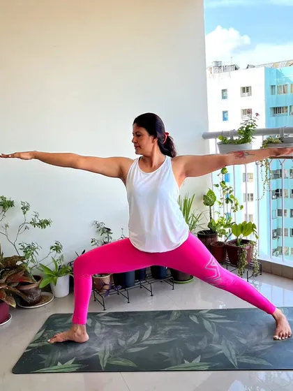 I don't spend all my time upside down. My love for yoga began with simple asanas like Virabhadrasana II, or Warrior Pose. A basic flow is still my go-to for an everyday practice.