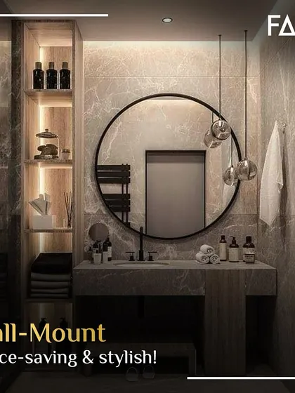 A wall-mounted or floating vanity is a fantastic way to create a sense of space and style. This design combines a sleek, round mirror and pendant lighting with a stone-textured vanity, making the bathroom feel larger and more open.
